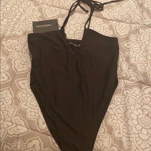 PrettyLittleThing black one piece.